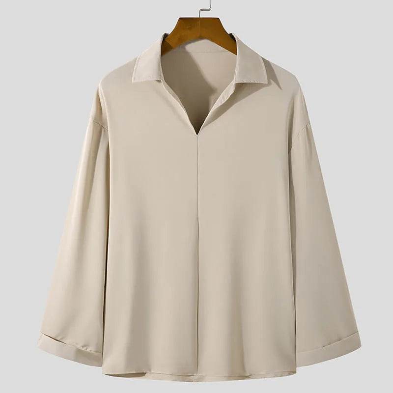 Men's loose lapel casual shirt in polyester blend available in four colours with non-ironing properties