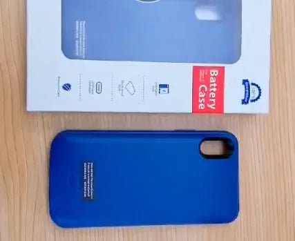 Shockproof silicone battery charging case for iPhone in black, blue, pink, or white colours.