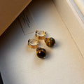Maillard geometric tigereye earrings with gold plating in brown and black colour options