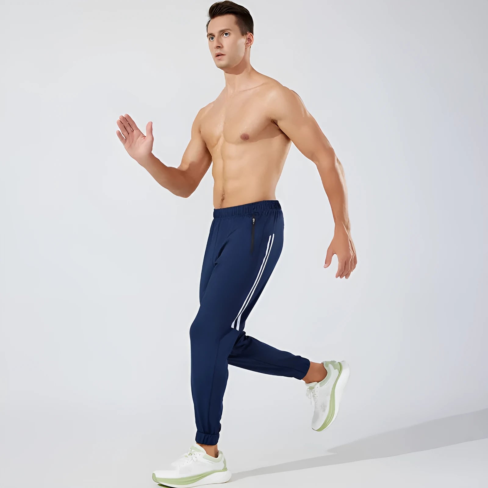 Men's black polyester running trousers with a mid waist design for exercise