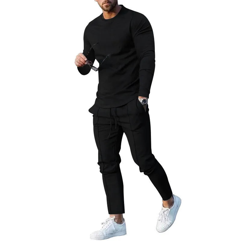 Men's light grey polyester two-piece suit with long sleeve round-neck t-shirt and matching trousers