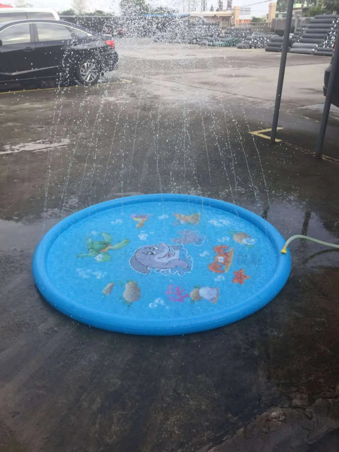 Blue PVC children's water play mat with marine animal designs measuring 100cm or 170cm for garden use