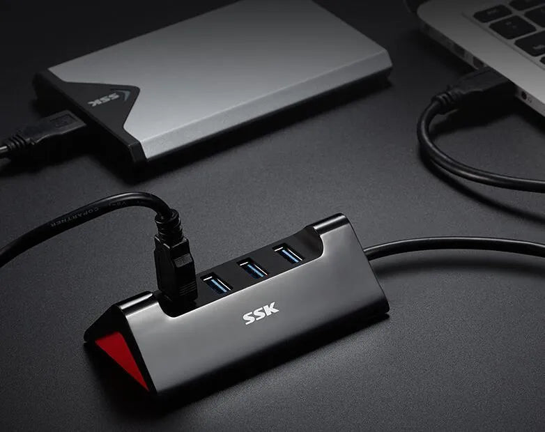 Black USB expansion dock with four ports and ABS construction measuring 100mm long