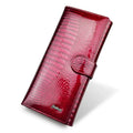 Women's patent leather coin purse with crocodile pattern texture in red colour