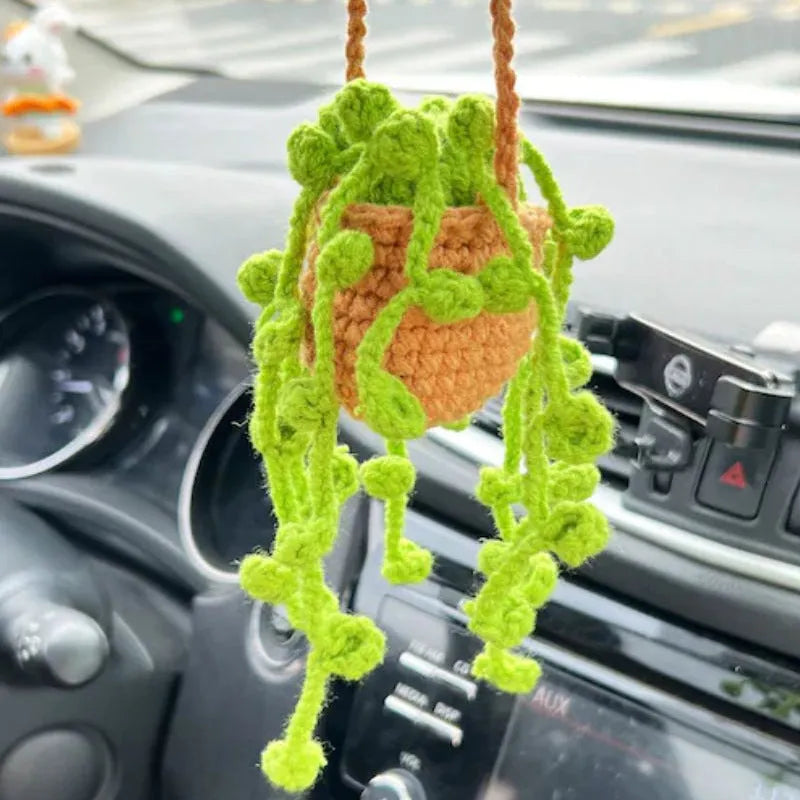 Green and white knitted wool car plant decoration hanging from 25cm white rope