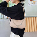 Horizontal square PU leather chain crossbody bag in light blue with an external pocket.