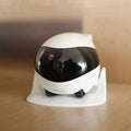 Smart home mobile surveillance robot camera on floor with charging dock