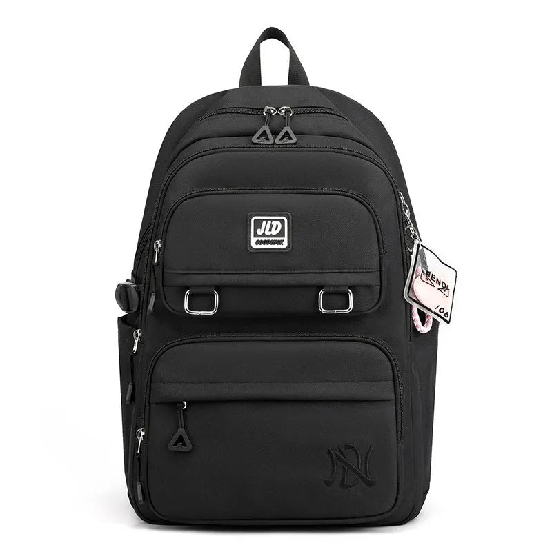 Girls' large capacity nylon school backpack with physiological curve backplate in various colour and print options.