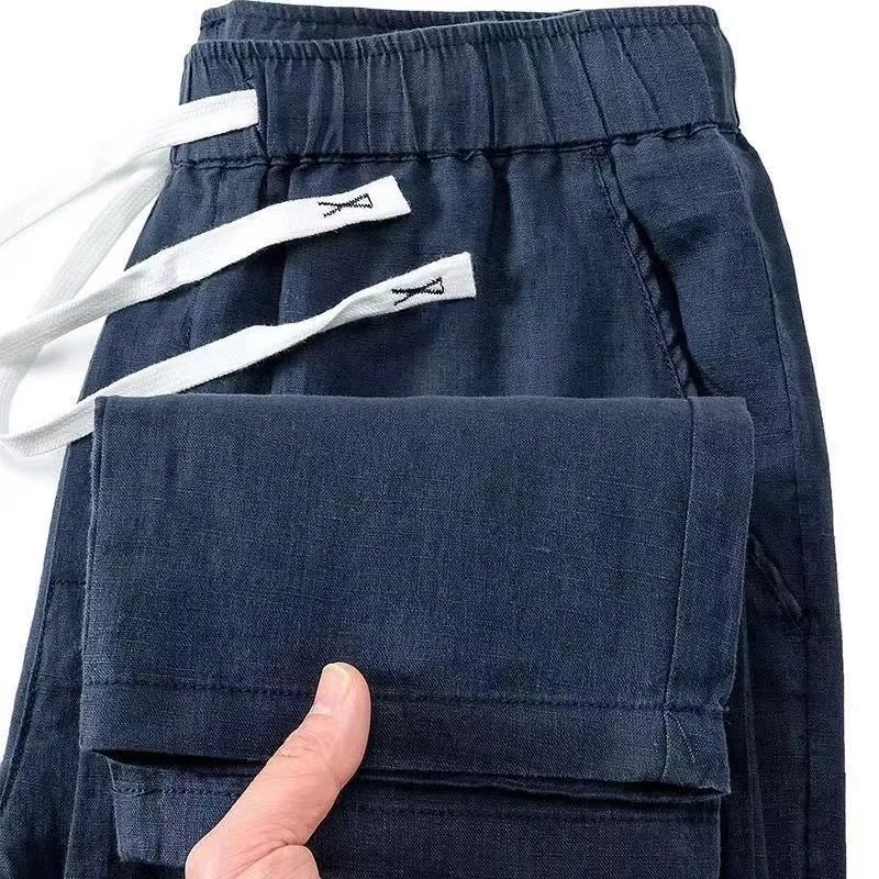 Chinese style Li Gao trousers in linen blend fabric with a drawstring waist, shown in a straight-leg cut.