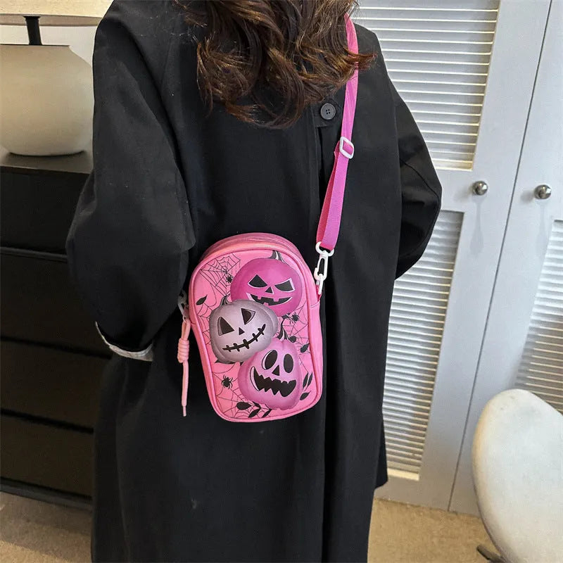 Halloween graffiti crossbody bag with pumpkin ghost bat print in black colour