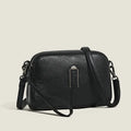 Square genuine leather ladies shoulder bag in dark khaki colour showing structured silhouette.