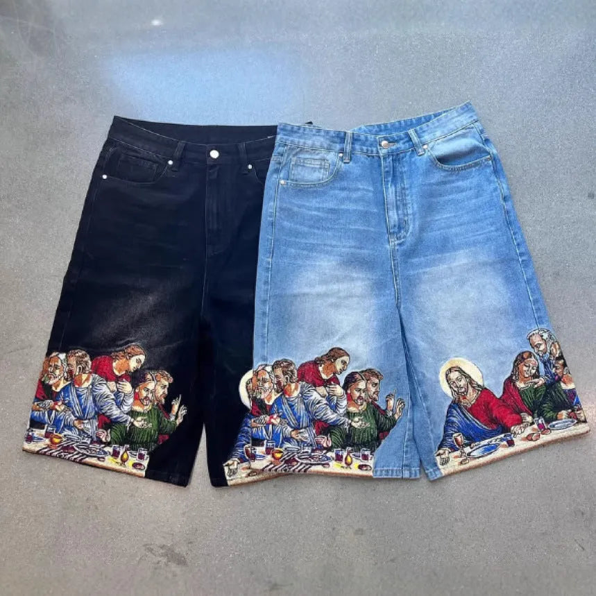 Men's blue cotton tapered shorts with Jesus print on back pocket, showing tapered leg design