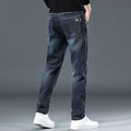 Men's slim straight loose casual trousers in blue grey or black, made from thin polyester fabric with micro elasticity.