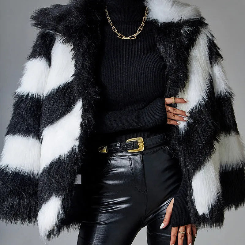 Women's faux fur coat with contrasting colour lapels and a fur collar.