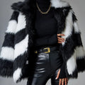 Women's faux fur coat with contrasting colour lapels and a fur collar.