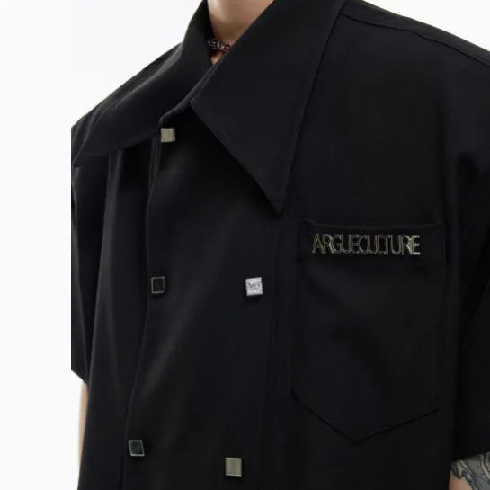Men's loose casual short-sleeved shirt in black with spliced design and metal button decoration