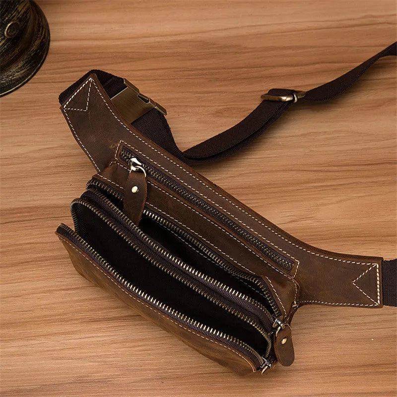 Brown cowhide leather men's sports waist bag with a zip closure.