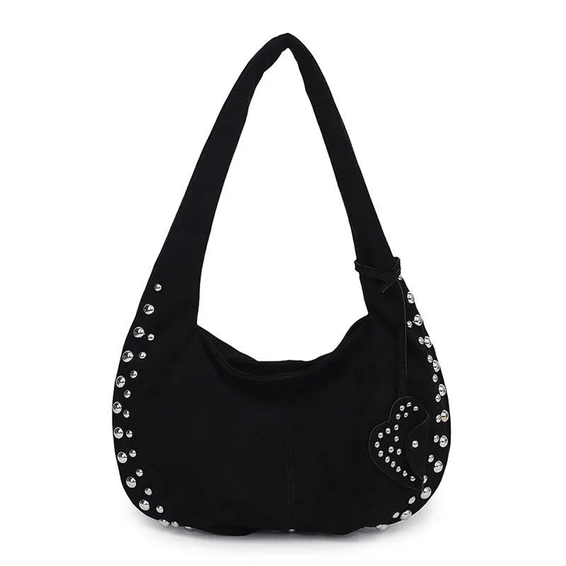 A soft plush retro style tote handbag for women in a strapless design, shown in a choice of colours.