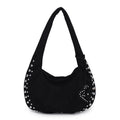 A soft plush retro style tote handbag for women in a strapless design, shown in a choice of colours.