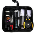 Black plastic case open to reveal a guitar and bass repair tool kit with metal tools for mandolin and banjo maintenance.