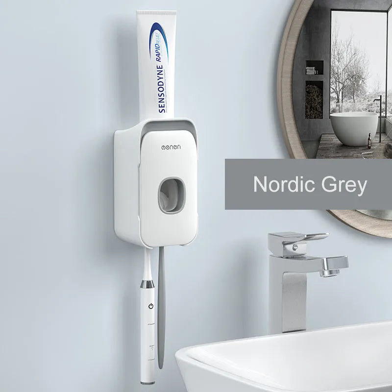Automatic toothpaste dispenser unit mounted on a bathroom wall in blue colour.