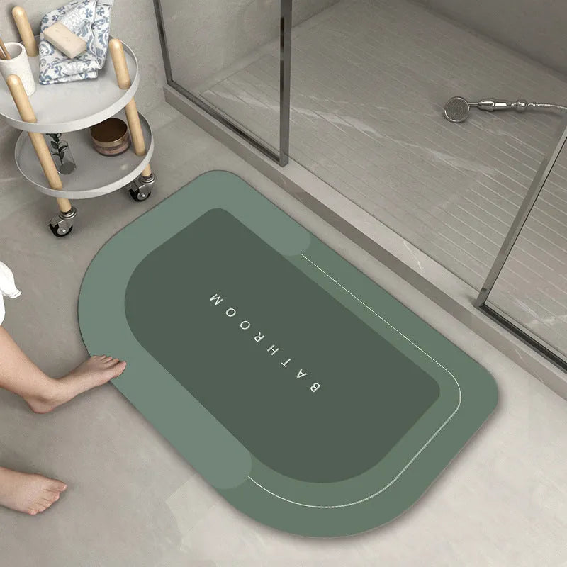 Blended fabric bathroom floor mat in blue colour, rectangular shape, on a tiled floor.