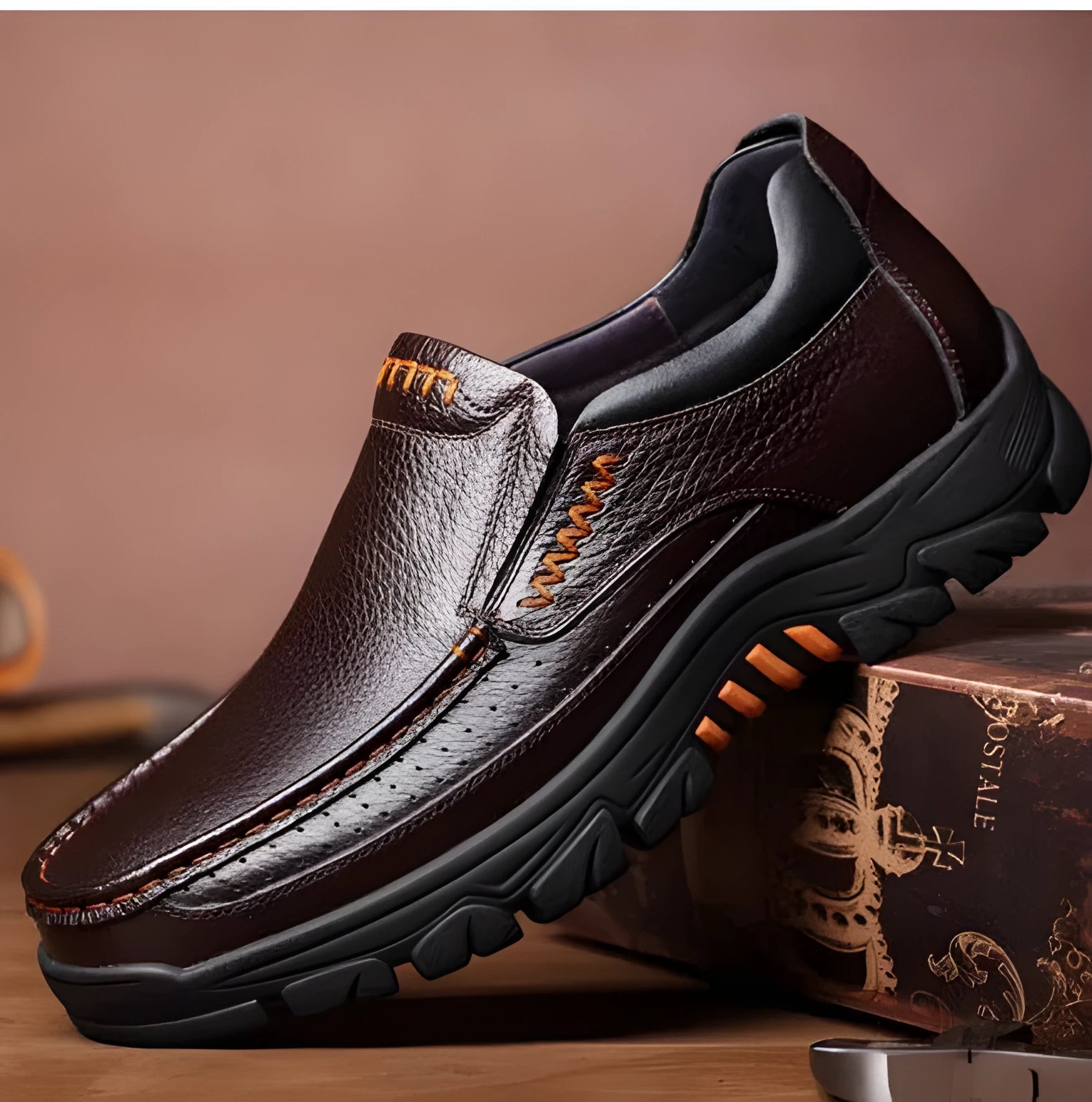 Business casual leather slip-on shoes in black and brown colours showing rubber sole and professional design