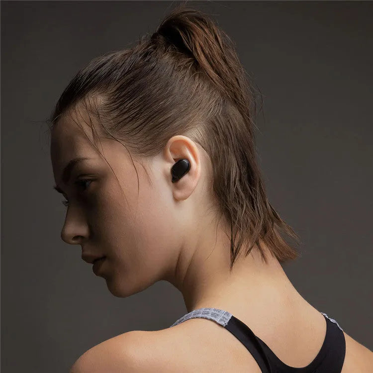 Redmi AirDots 2 black true wireless earbuds with charging case on a white background