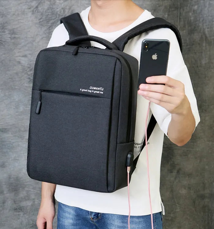 Waterproof shockproof Oxford cloth laptop backpack in multiple colours, shown with a laptop.