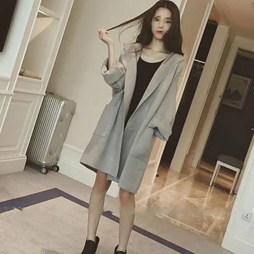 A grey plus size women's thin cotton coat with lace detailing and long sleeves.