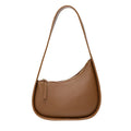 Women's genuine leather half-moon shoulder handbag with wide strap in caramel colour