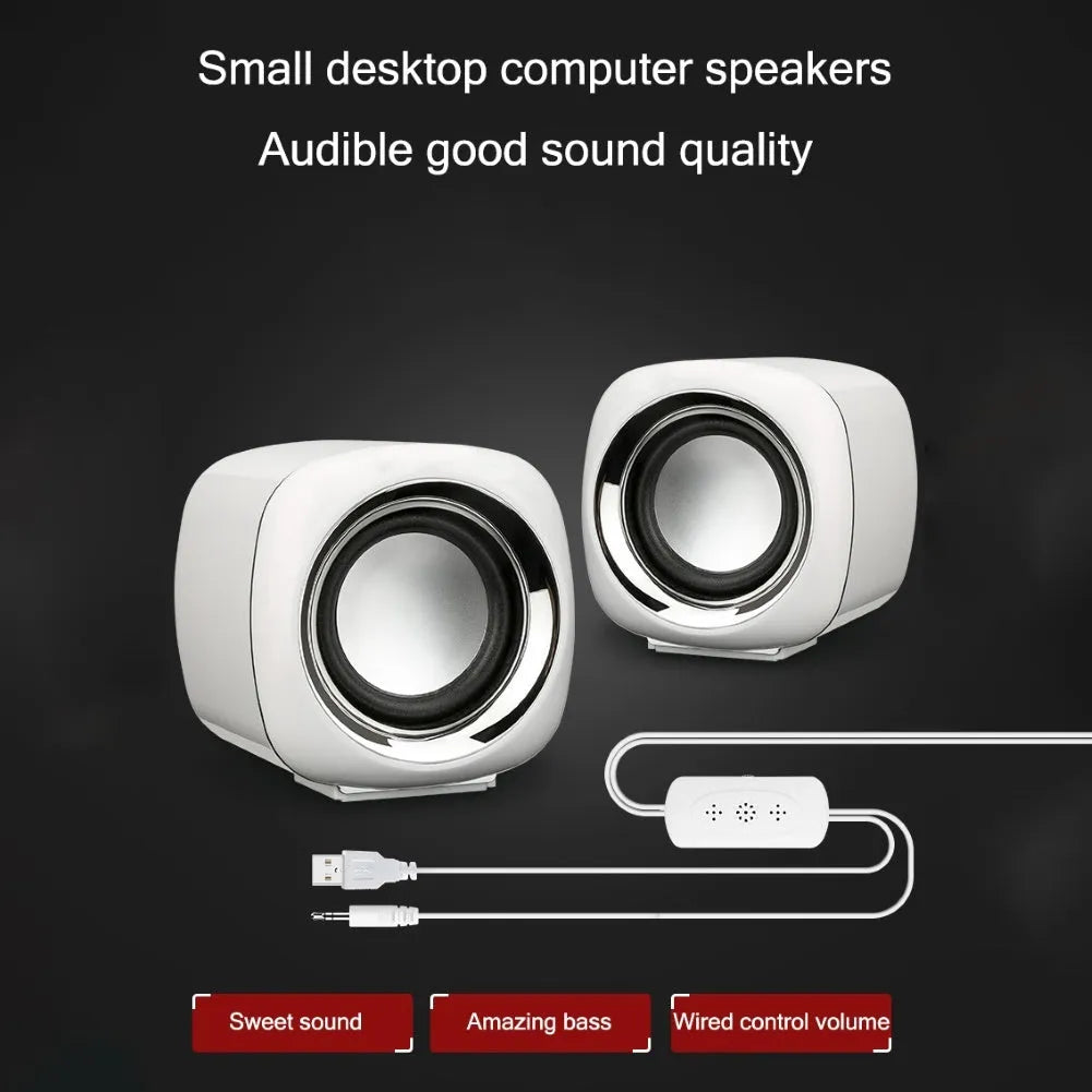 Pair of mini wired computer speakers with volume scroll wheel in black or white colour