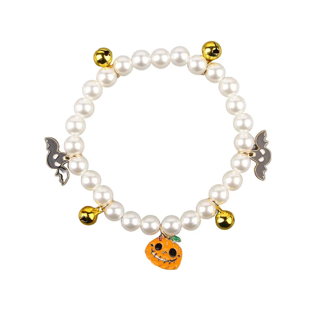 Halloween pet collar with simulated pearl beads and purple ghost pumpkin decoration for cats