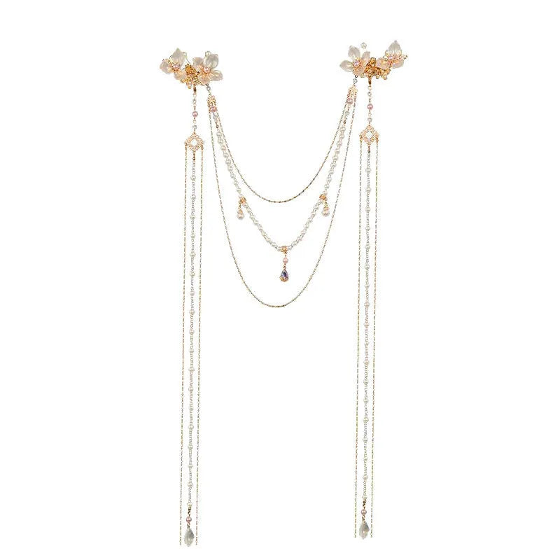 Gold women's hairpin with diamond flower design and long acrylic tassels