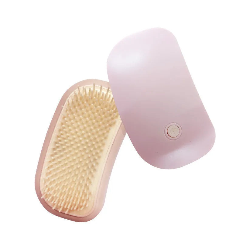 Pink electric pet massage brush with TPE teeth for cat and dog grooming