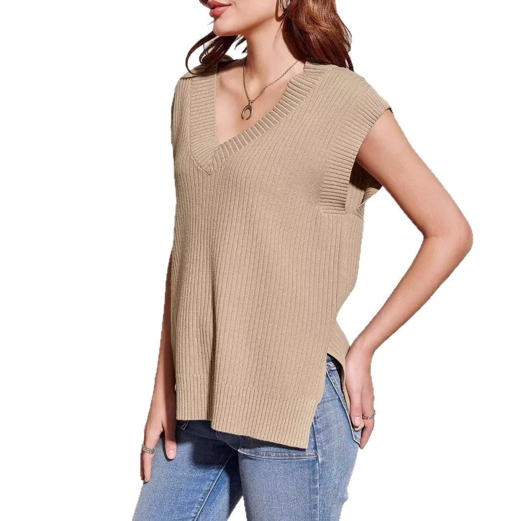 A woman's camel-coloured loose V-neck sleeveless vest with a thin striped pattern, laid flat.