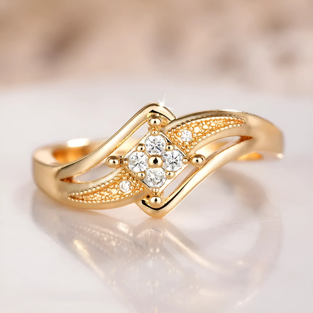 Yellow gold coloured copper diamond ring with geometric design and micro inlaid zircon detailing