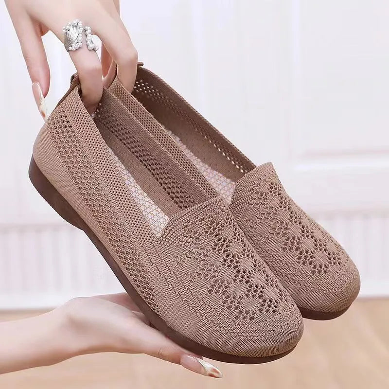 Women's beige low-top mesh tennis shoes with a round toe and anti-skid PVC sole, shown on a neutral background.