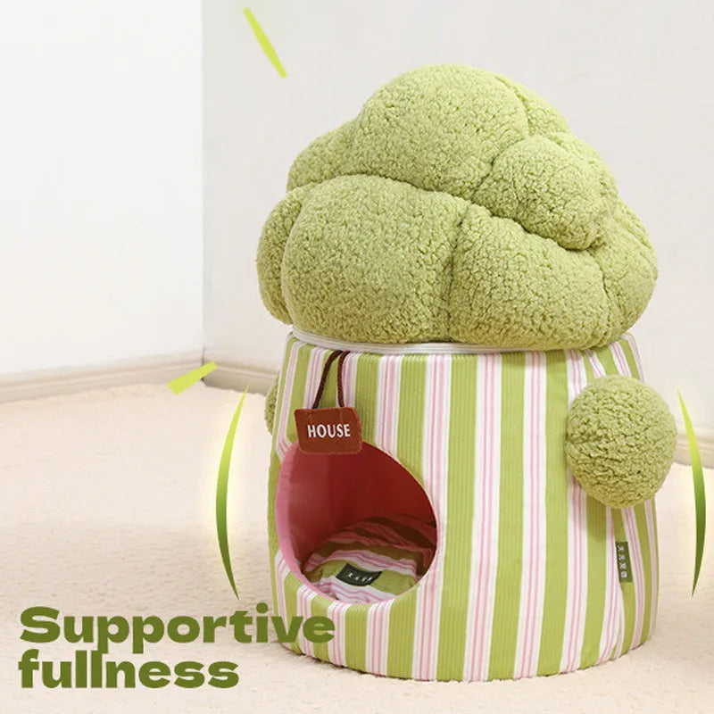 Green cauliflower-shaped enclosed cotton pet house for small dogs or cats on a wooden floor.