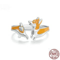Silver ring with a raised cartoon corgi design in colour SCR1014-E.