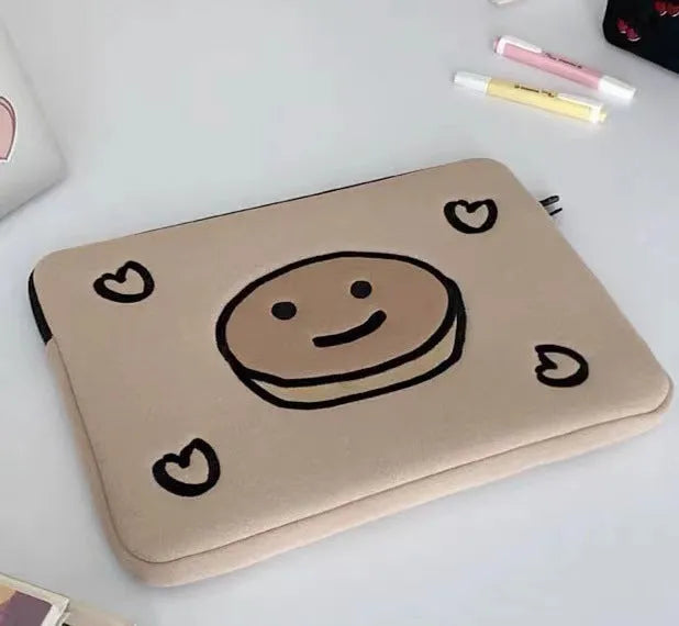 Embroidered laptop sleeve with animal design showing polyester construction and laptop size compatibility