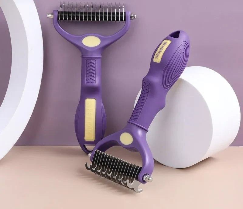 Purple double-sided plastic pet comb for untying knots on dogs and cats.