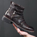 Black embossed PU cowboy boots with a side zipper and mid-height horseshoe heel on a plain background.