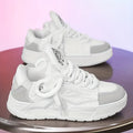 Men's white clunky sneakers with thick rubber sole and round toe lace-up design