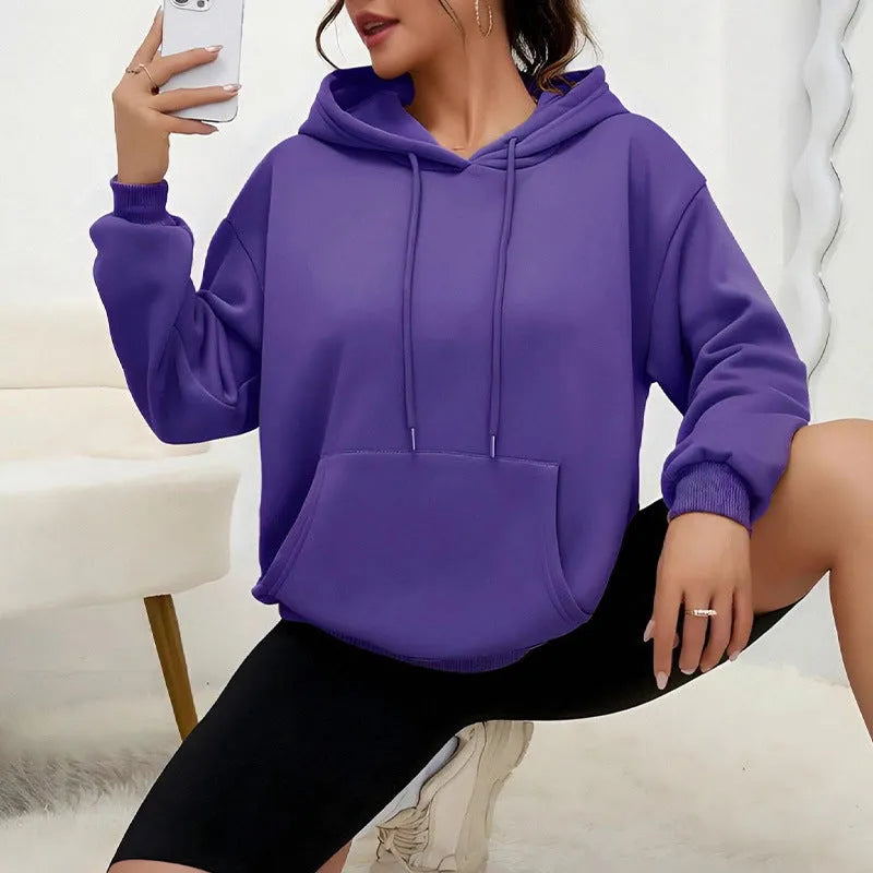 Women's loose grey drawstring hoodie sweatshirt with front kangaroo pocket