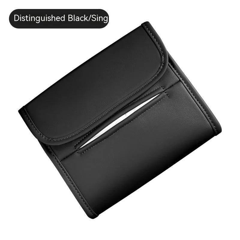 Leather car tissue holder box with elastic strap for mounting on seat back.