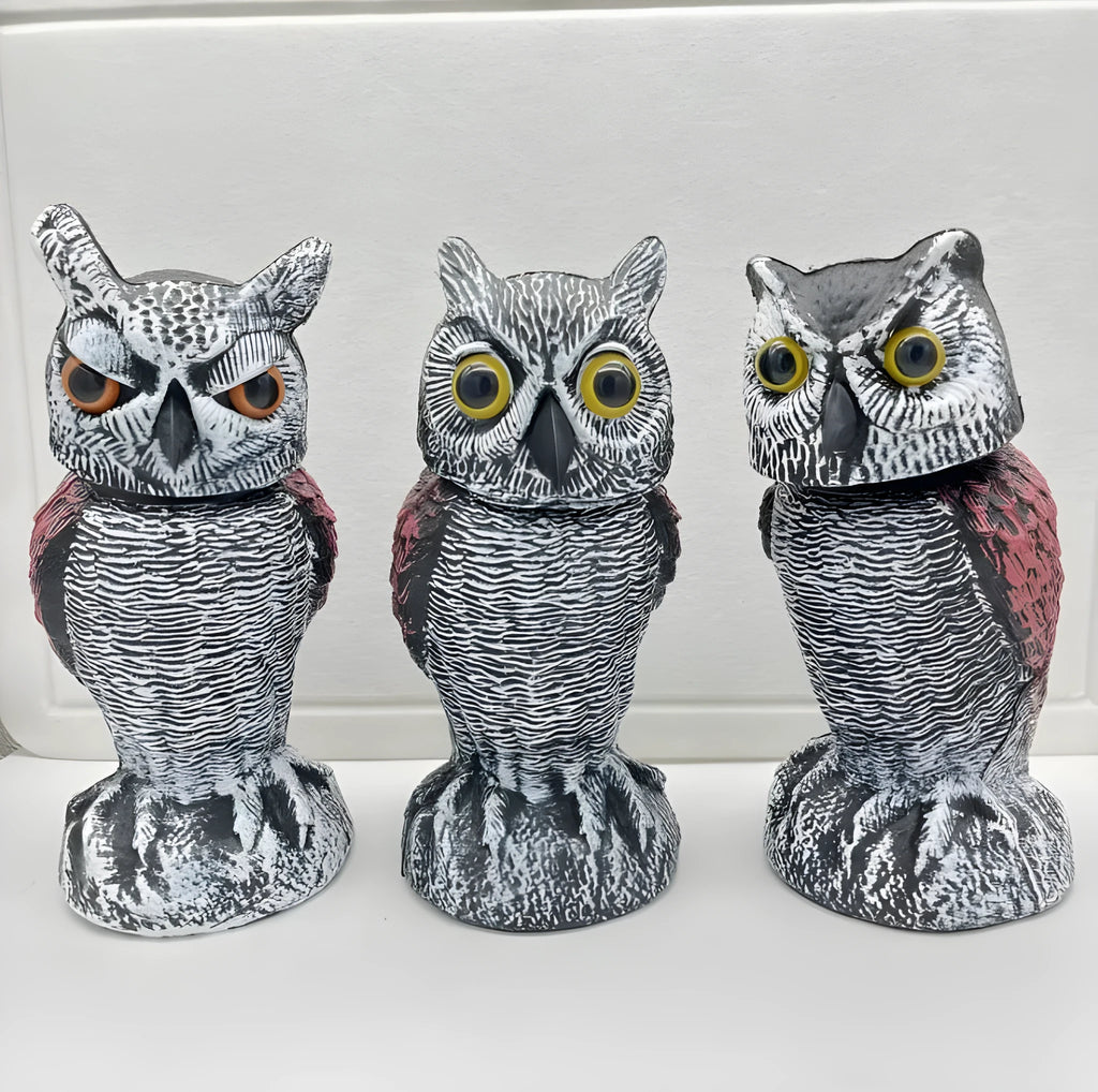PE plastic artificial owl bird deterrent ornament with shaking head in outdoor garden setting
