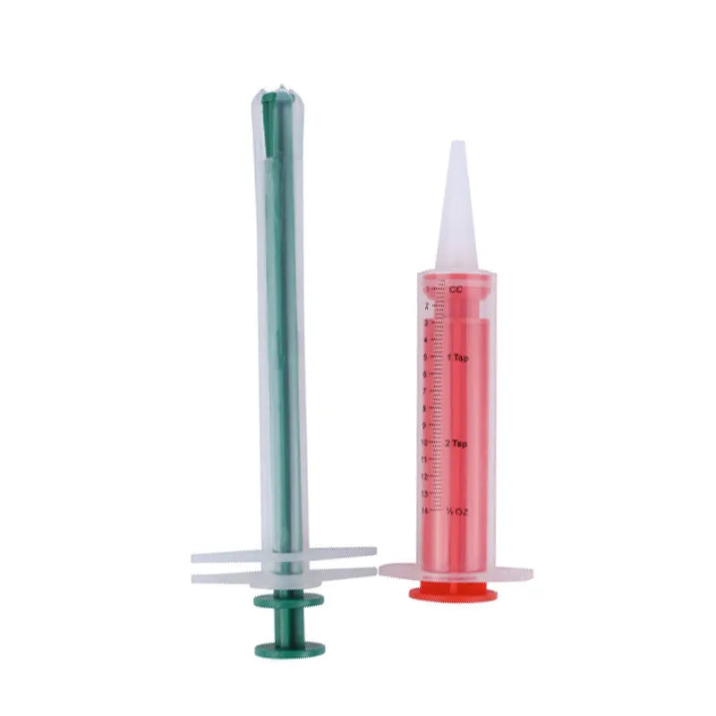 Two white pet pill shooter dispensers with soft silicone tips and push rods for administering tablets to cats and dogs.