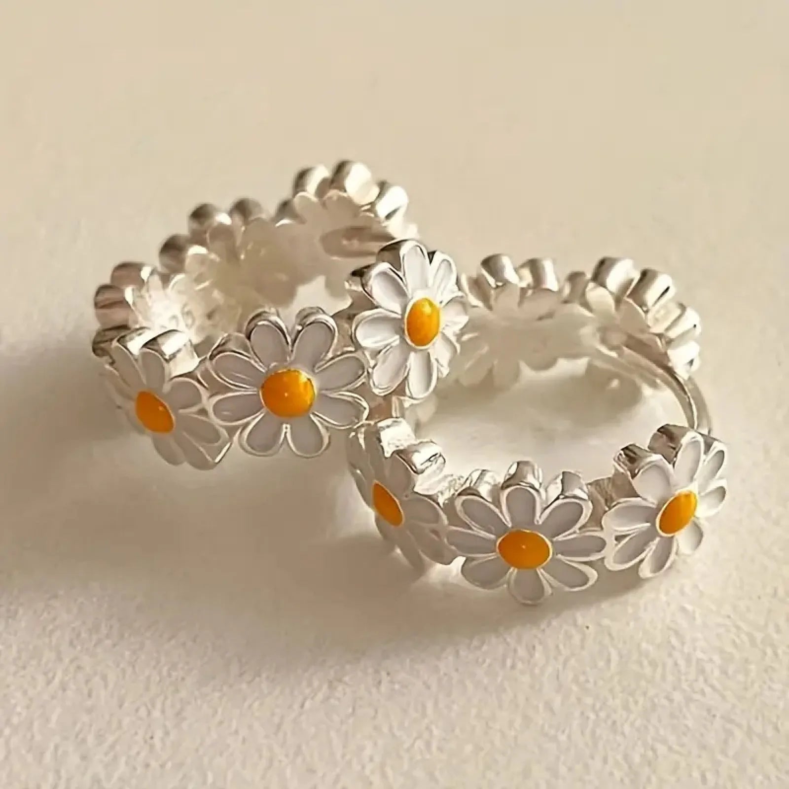 White daisy flower ring earrings with platinum gem accents on electroplated copper