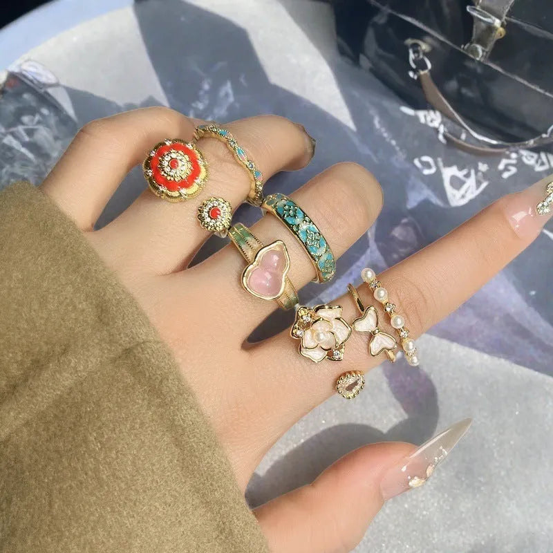 Adjustable copper gourd ring with inlaid zircon stones in a vintage oil dripping finish.